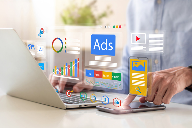 Businessman using laptop with Ads dashboard digital marketing strategy analysis.